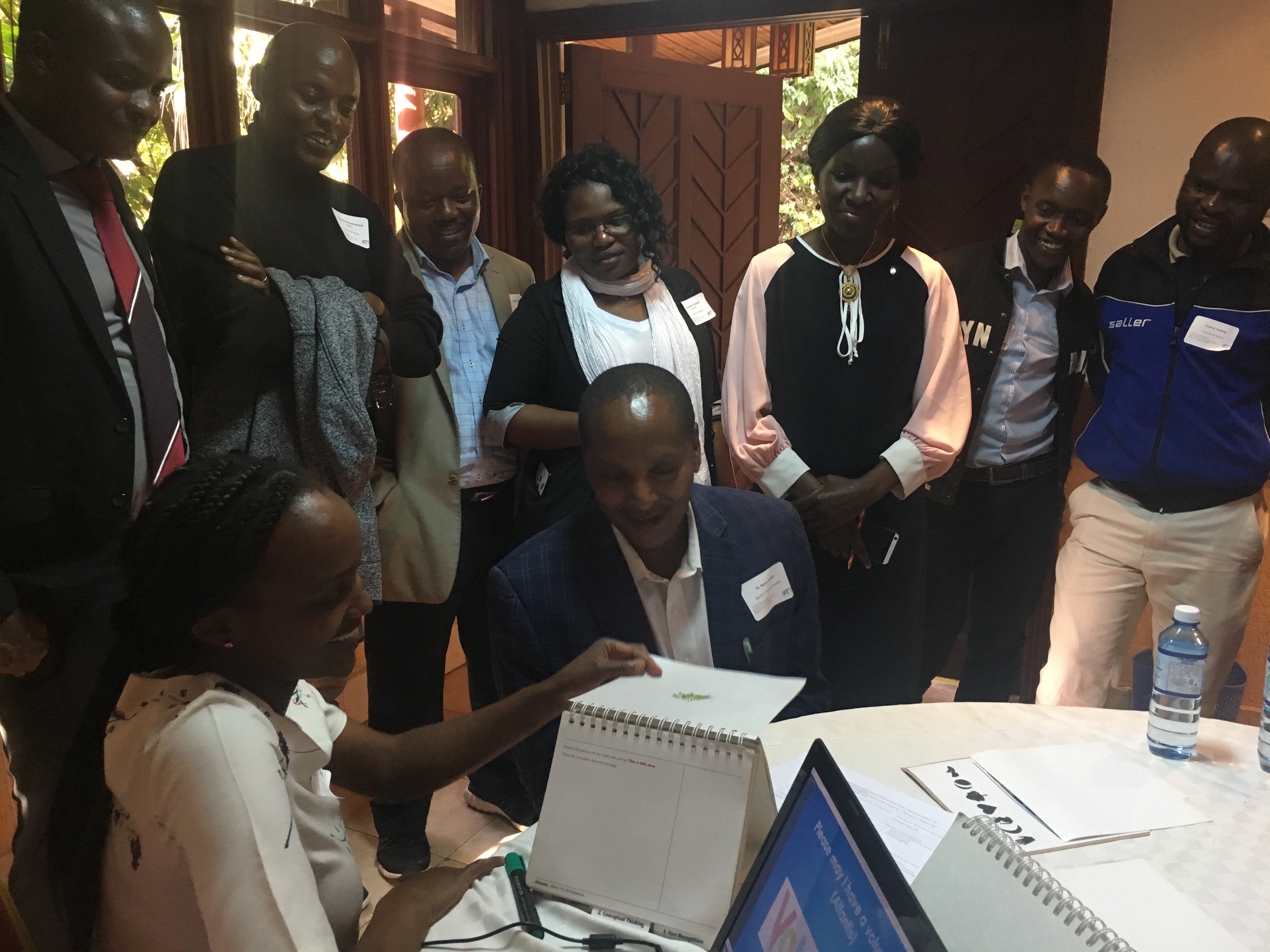 7. Alice Mueni (University of Nairobi-Kenya) demonstrates a neurocognitive assessment for children (Kauffman Assessment Battery for Children) with Dr. Daniel Maina (Aga Khan University).