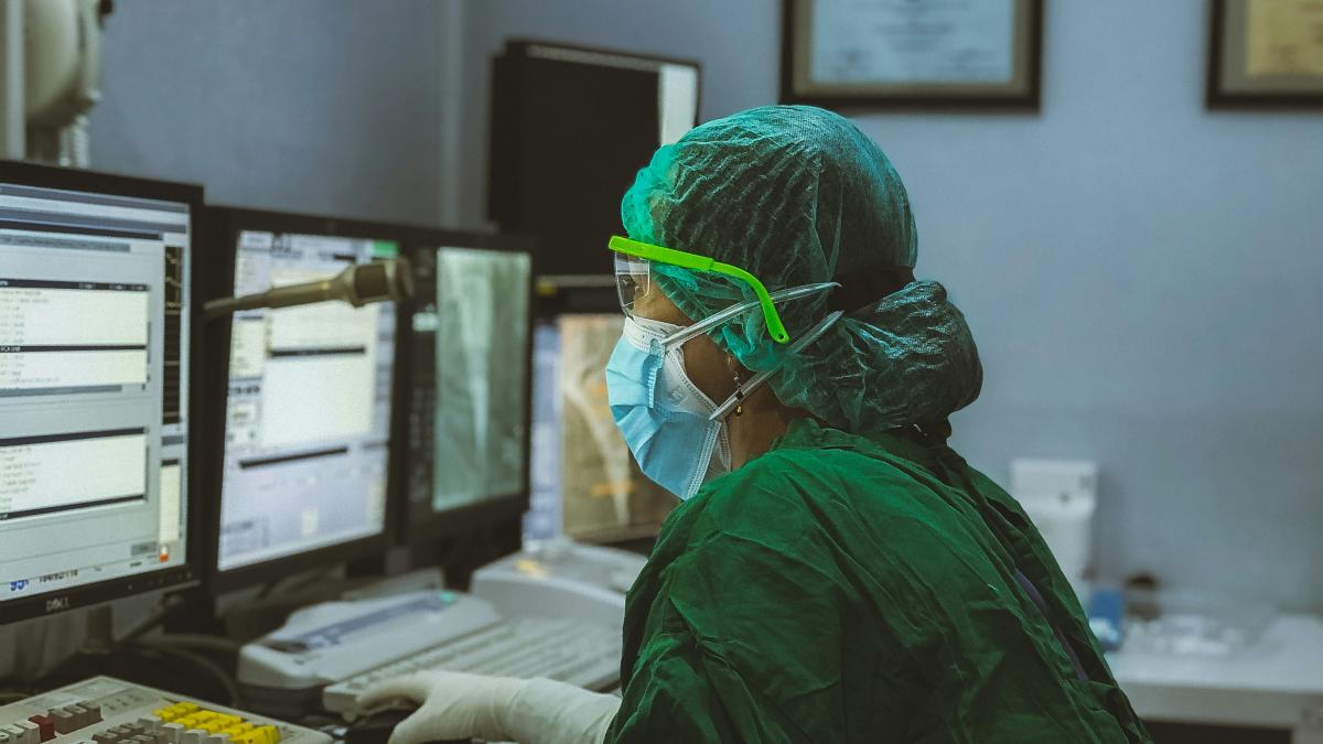 Medical worker on computer